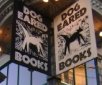 Dog Eared Books logo